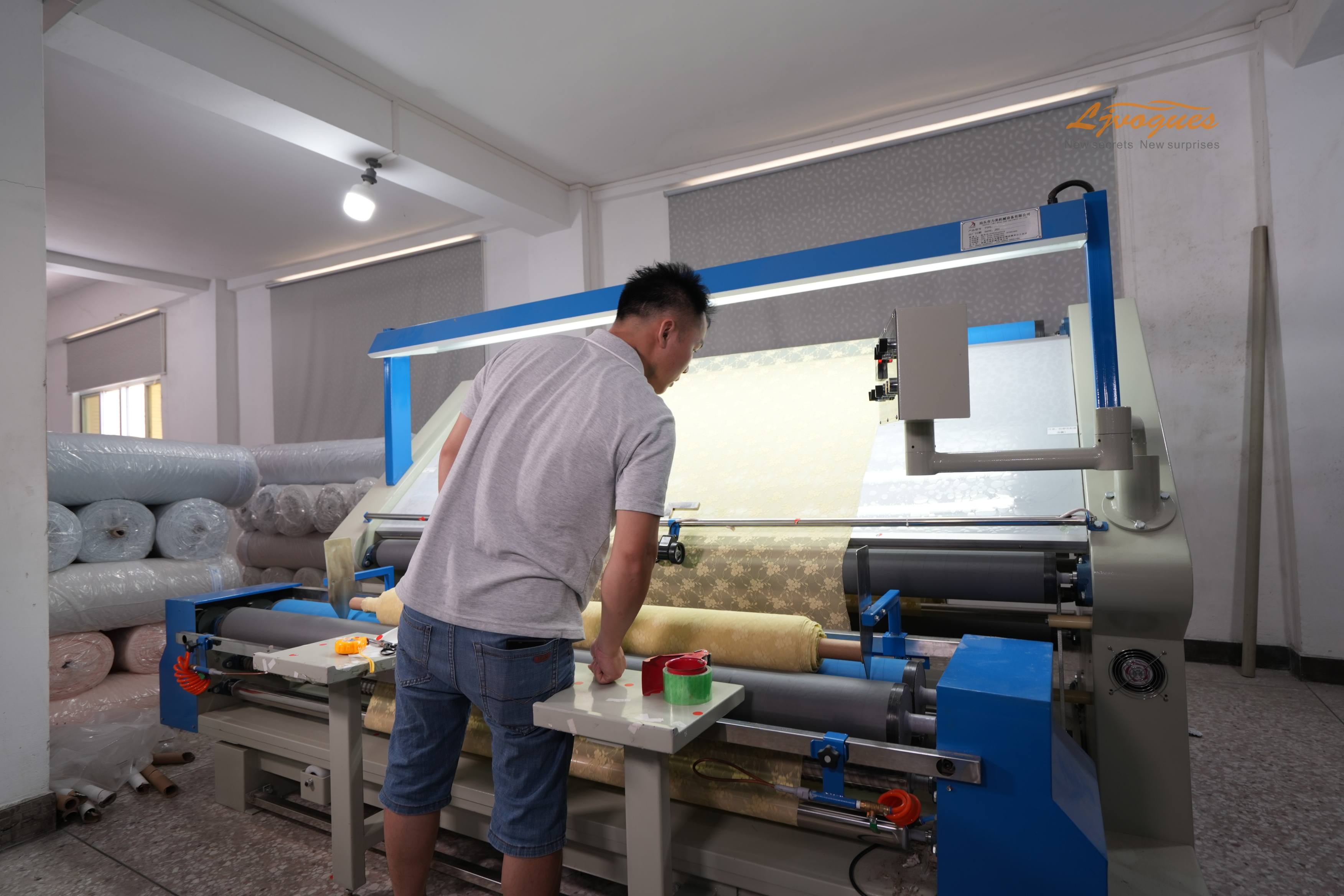 Ljvogues quality team inspecting lingerie fabric before production