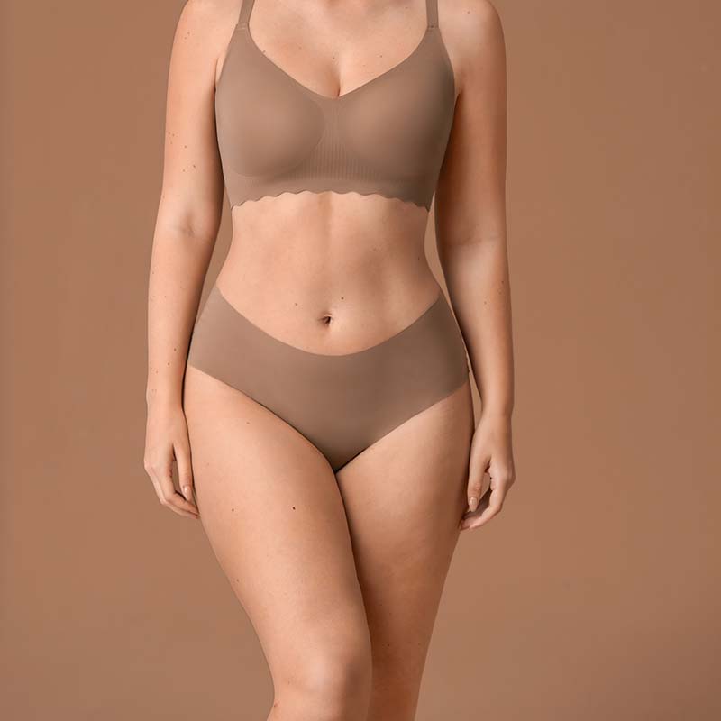 Seamless No-Show Mid-Rise Brief (P0025) — side view showing rise, leg opening and stretch recovery