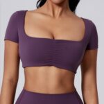 Plus-Size Activewear Top: front fit showing silhouette, waistband and activewear coverage