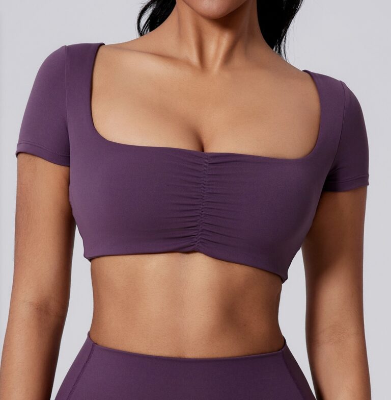 Plus-Size Activewear Top: front fit showing silhouette, waistband and activewear coverage